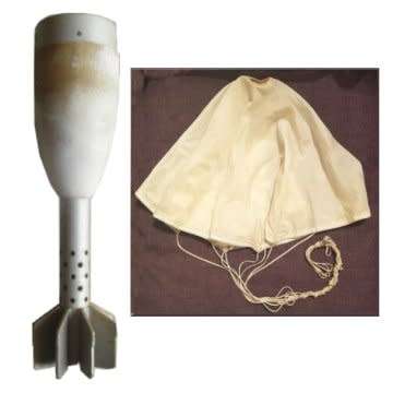 Illuminating Mortar Shell Casing With Suspending Parachute.
