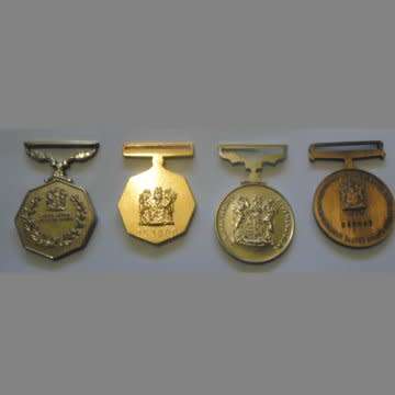 A Group Of Four S.A.N.D.F Full size Medals Without Ribbons - Numbered.