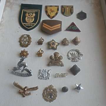 A Lot Of Military Badges.