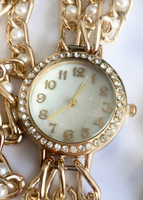 Wrap Around Sim.Pearls Set in Woman's Imported Gold Plated Watch