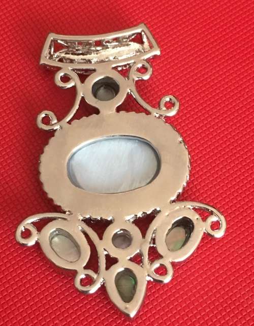Exquisite Imported Simulated Gemstone Set in White Rolled Gold Pendant