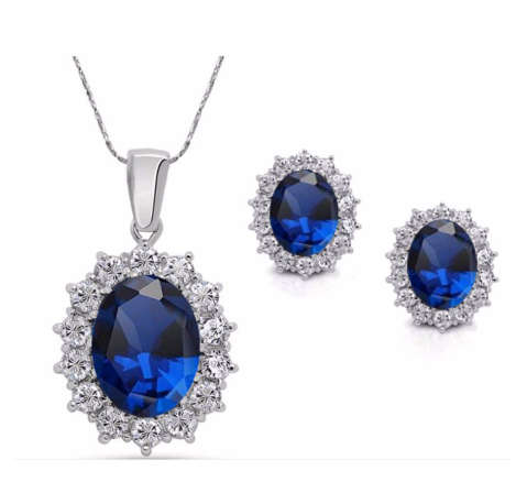 Attractive Sim Sapphire Surrounded By White Diamond Pendant with Free Matching Earrings.