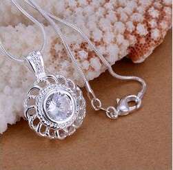 $$$$SIMPLY SO SWEET AND SEXY SWAROVSKI SET IN .925 SILVER PENDANT$$$$