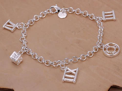 @@@@ UNIQUE AND DIFFERENT 925 STERLING SILVER CHARM BRACELET @@@@