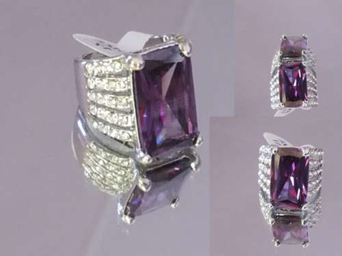 PRETTY AND DEFINITELY ONE OF A KIND .925 STERLING SILVER RING