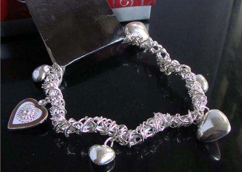 STRETCHY SILVER CHARM BRACELET