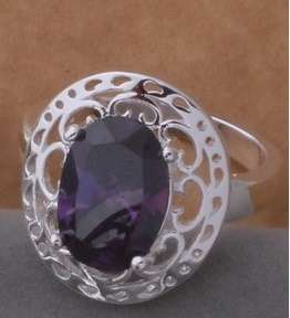 ELEGANT AND STYLISH AMETHYST AUSTRIAN CRYSTAL 925 STERLING SILVER RING ## SIZE 8