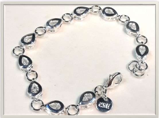 Attractive and Sparkling Teardrop Indian Crystals Set in 925 Sterling Silver Filled Tennis Bracelet