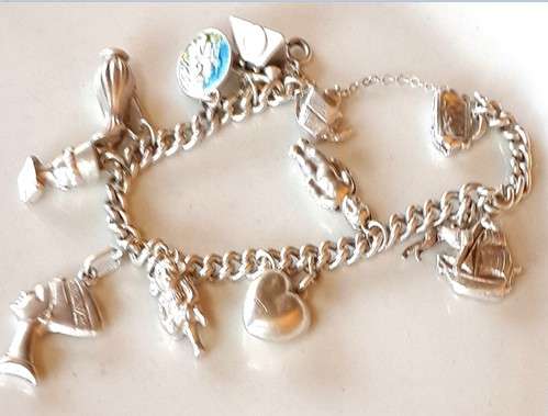 Elegant and Sweet Newly Imported  Solid 925 Sterling Silver 12  Charm Bracelet