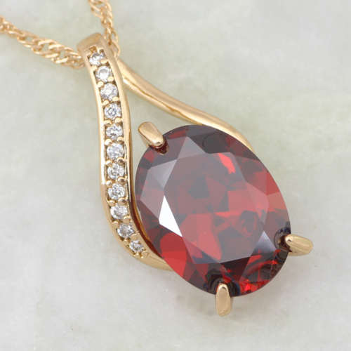 Cr. Pigeon Red Ruby Surrounded with White Diamond Crystals in 18ct Yellow Rolled Gold Pendant