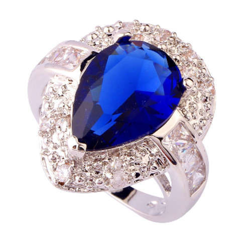 -- Size 7 -- Royal Blue Teardrop Sapphire Set in 925 Silver Ring (6.9gr)