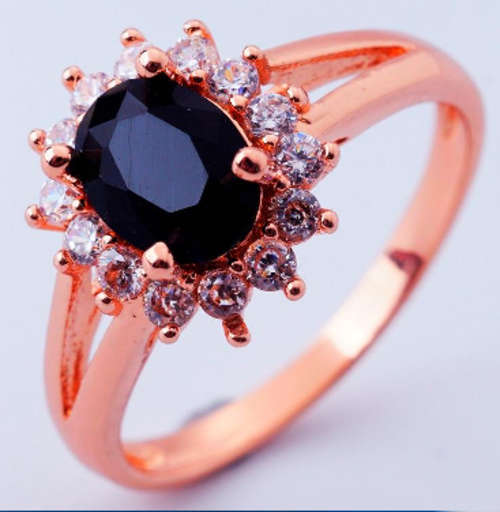 8x6 mm (2.6gr.) Imported Black Onyx Surrounded by white Diamonds Ring (Size 7)