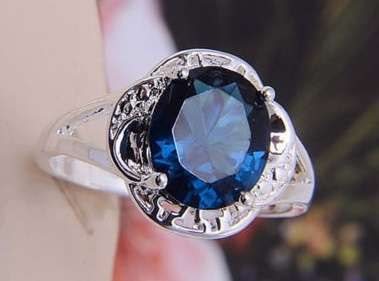-- Size 8.5 -- Dark Greenish/Blue Oval Cut 2.7gr. Sapphire Ring with 925 Marking