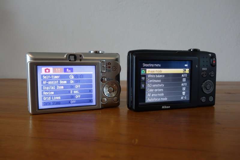 Two old digital point & shoot cameras, Nikon & Canon