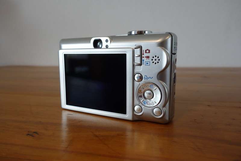 Two old digital point & shoot cameras, Nikon & Canon