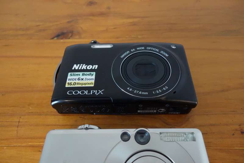 Two old digital point & shoot cameras, Nikon & Canon