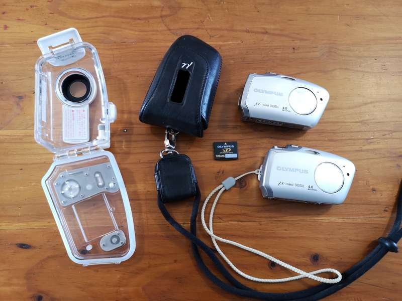 Two Olympus mju-mini digital compact cameras