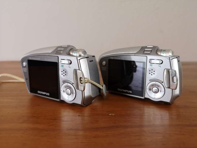Two Olympus mju-mini digital compact cameras
