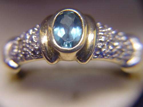 9ct Gold Topaz And Diamond Ring