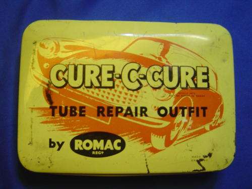 Classic motor vehicle like Aston Martin or Jaguar Tube repair kit tin