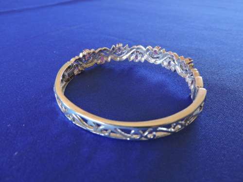 RUBY and SILVER HINGED BANGLE WITH 9 NATURAL RUBIES AND MARCASITE