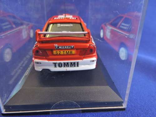 Mitsubishi Lancer EVO V1 Makinen and Mannisenmaki New Zealand racing 1999 rally 1:43.Like Dinky