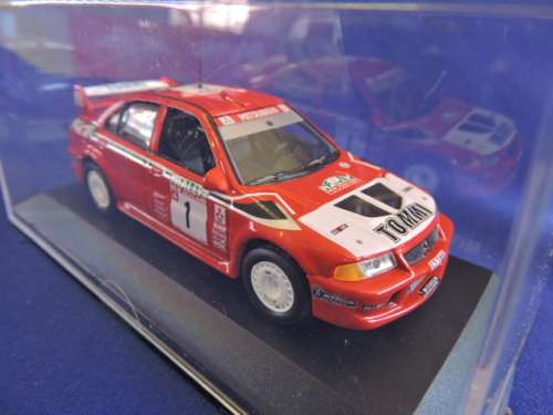 Mitsubishi Lancer EVO V1 Makinen and Mannisenmaki New Zealand racing 1999 rally 1:43.Like Dinky