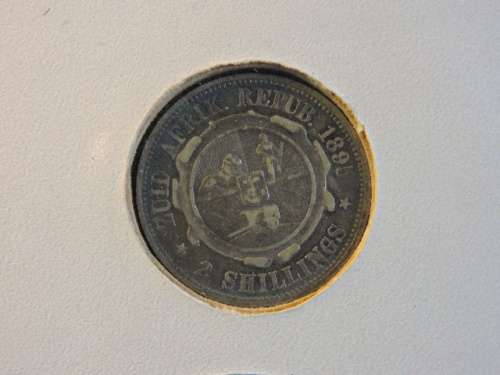 Framed ZAR 1895 2 Shillings Coin with 1927 SWA Motor Vehicle License disk / Token and Train Stamps