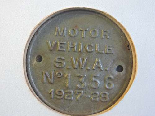 Framed ZAR 1895 2 Shillings Coin with 1927 SWA Motor Vehicle License disk / Token and Train Stamps