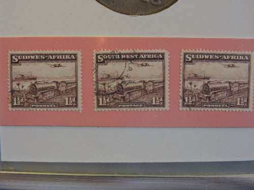 Framed ZAR 1895 2 Shillings Coin with 1927 SWA Motor Vehicle License disk / Token and Train Stamps