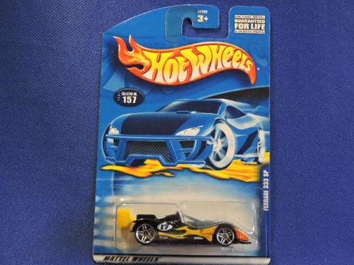 Hot Wheels Ferrari 333 SP  ( Black with yellow flame #17 )  Long Card