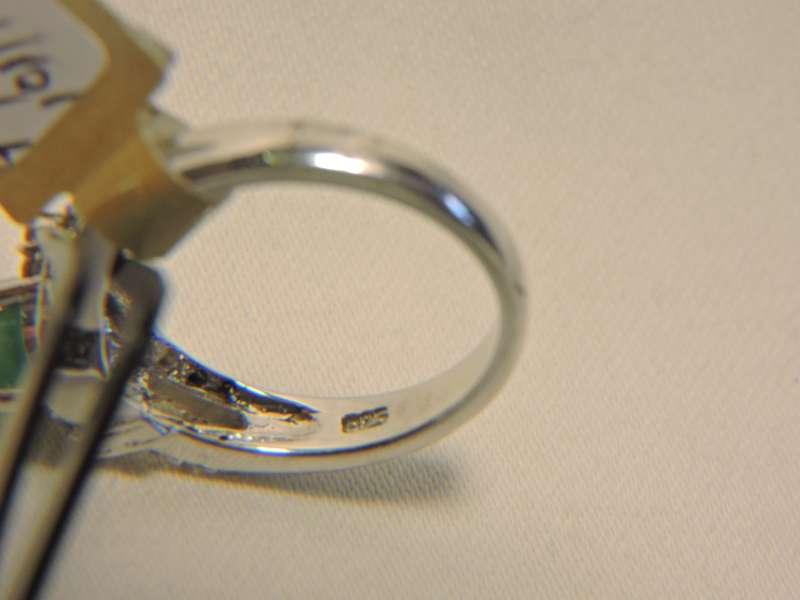 Sterling Silver Emerald & Zirconia (green stone) ring.