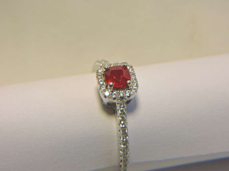 Sterling Silver Ruby & Zirconia (red stone) ring.