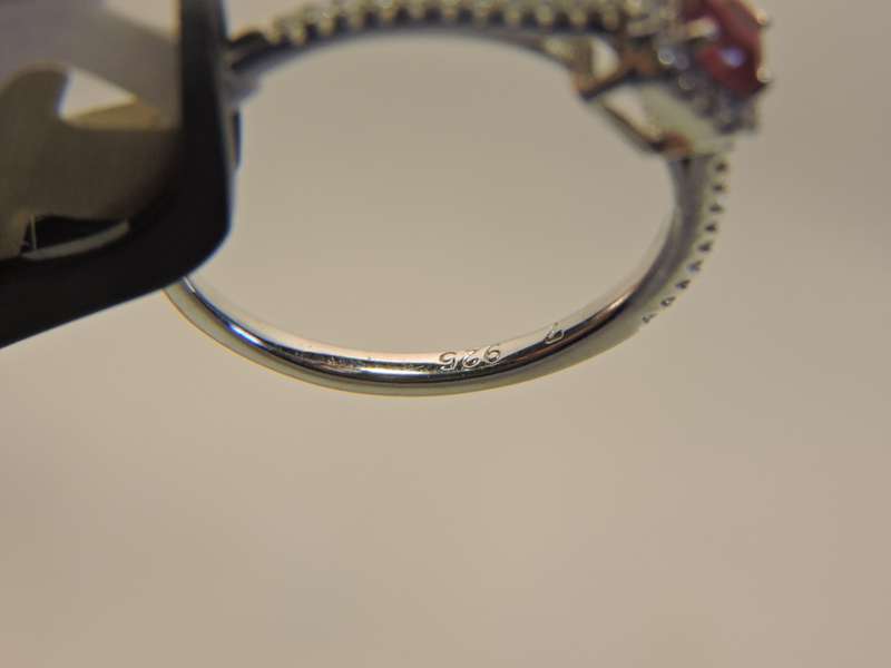 Sterling Silver Ruby & Zirconia (red stone) ring.