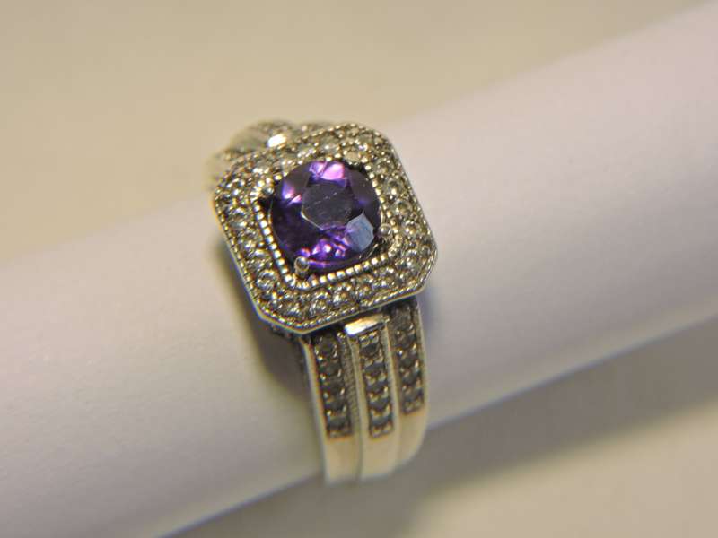 Sterling Silver, Amethyst & Zirconia (purple stone) ring.