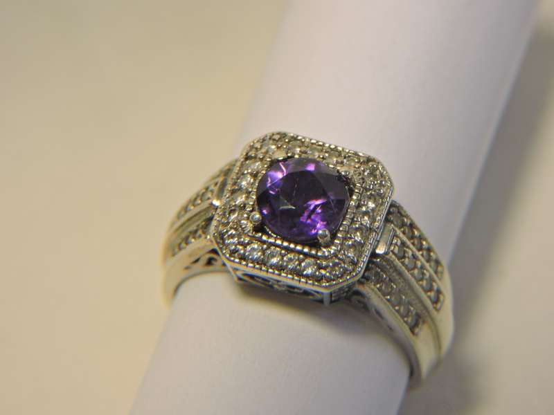 Sterling Silver, Amethyst & Zirconia (purple stone) ring.