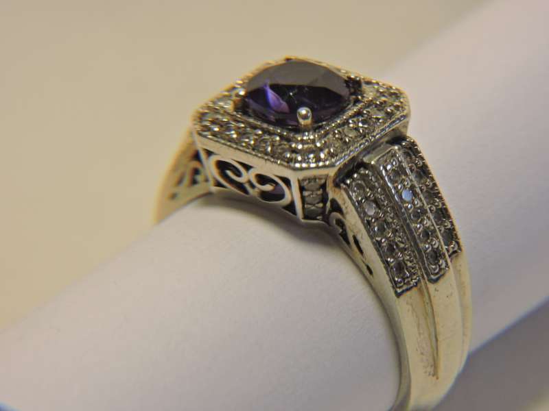 Sterling Silver, Amethyst & Zirconia (purple stone) ring.