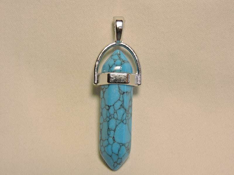 Contemporary Turquoise pendant ( crystal cut blue stone pendant).