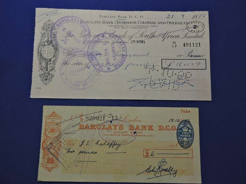 Bank Cheque x 2  1956 National Bank of SA and Barclays Bank D.O.C London.