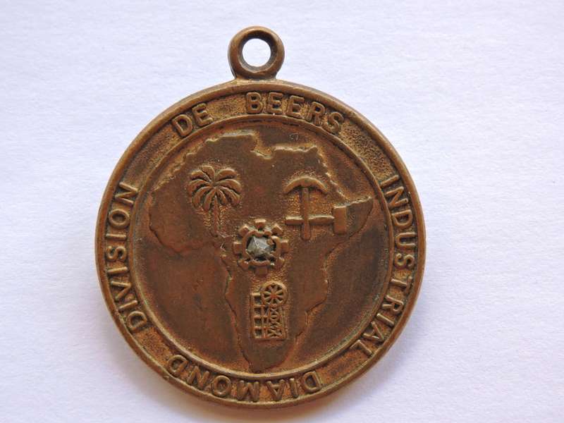 De Beers Industrial Diamond Division MEDALLION with genuine DIAMOND in middle.   Like Medal