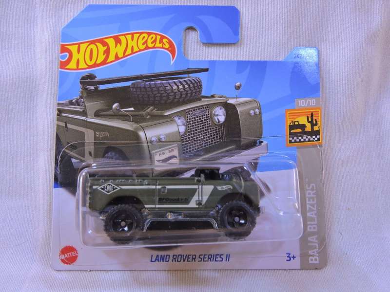 Hot Wheels Land Rover Series 11 ( Green with Surf Board )