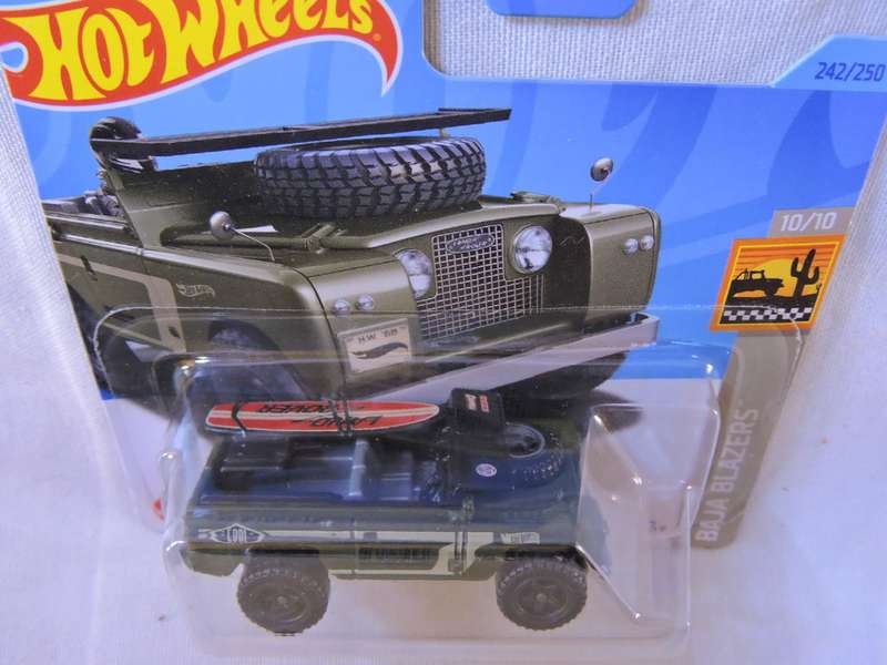 Hot Wheels Land Rover Series 11 ( Green with Surf Board )