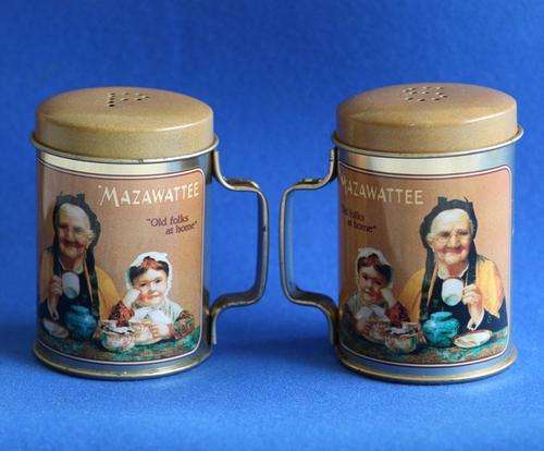 A PAIR OF SUPER RARE "MAZAWATTEE TEA" METAL ORNAMENTAL SALT AND PEPPER SHAKER SET