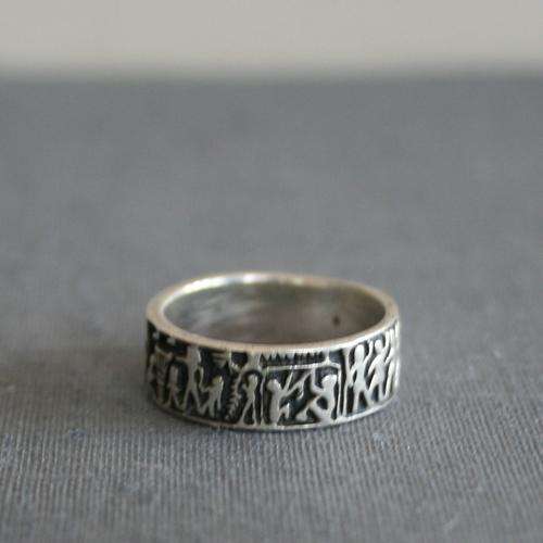 Sterling silver ring with hieroglyphic detail