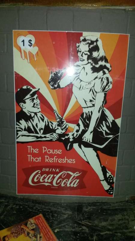 coke metal sign