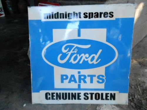 ford genuine stolen parts metal sign
