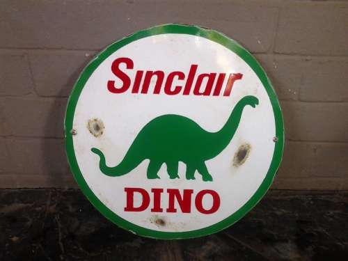 sinclair dino round metal sign