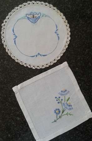 Two vintage linen embroidered doilies