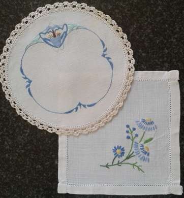 Two vintage linen embroidered doilies