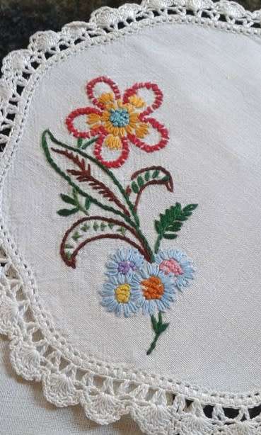 Two lovely vintage embroidered linen doilies 20cm square